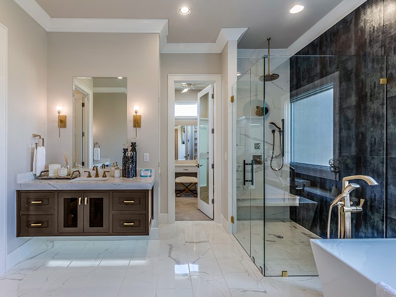 Large modern master suite with spectacular marble and wall tile